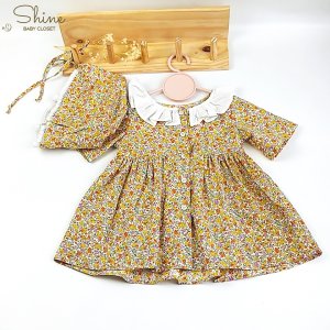 Set 2 váy hoa cho bé gái Shine Baby Closet kèm nón bonet kiểu dáng vintage đáng yêu với họa tiết hoa nhí màu vàng.-7